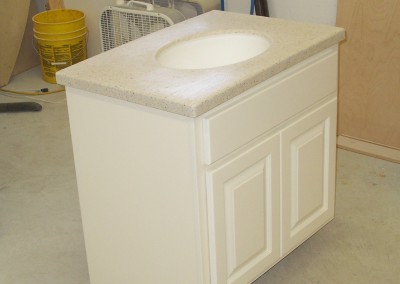 White Vanity with Built-In Toilet Roll Holder