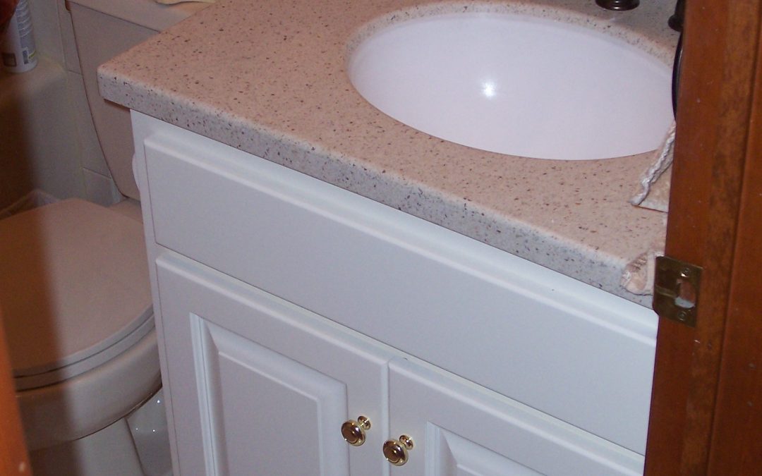 White Vanity with Built-In Toilet Roll Holder