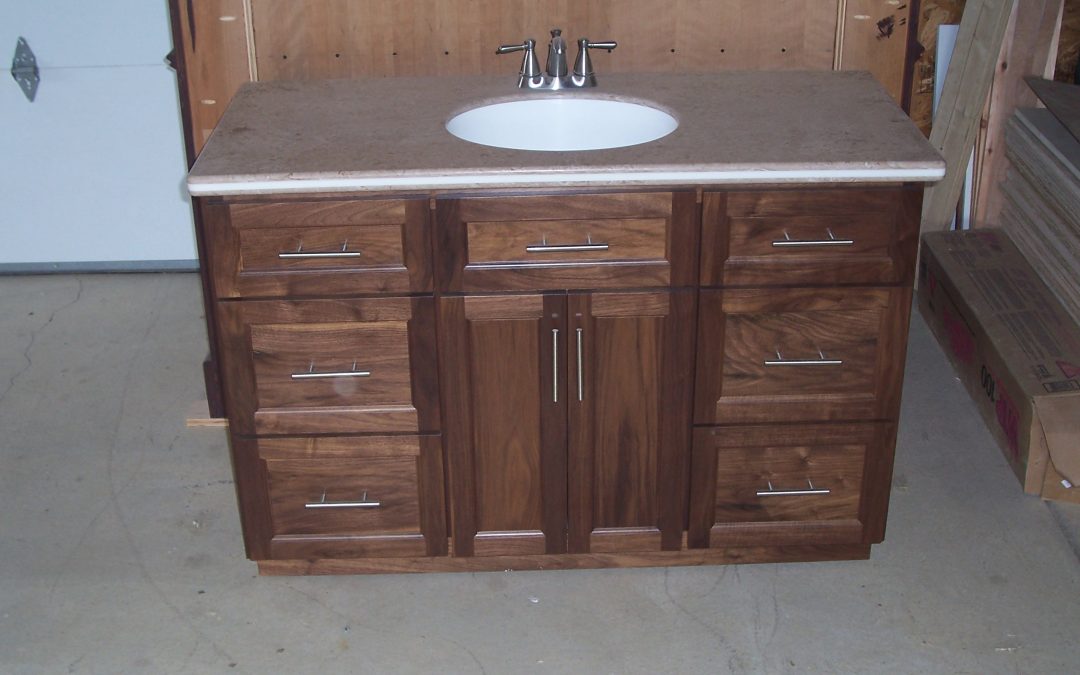 Dark Vanity with Stone Counter and Undermount Sink 1